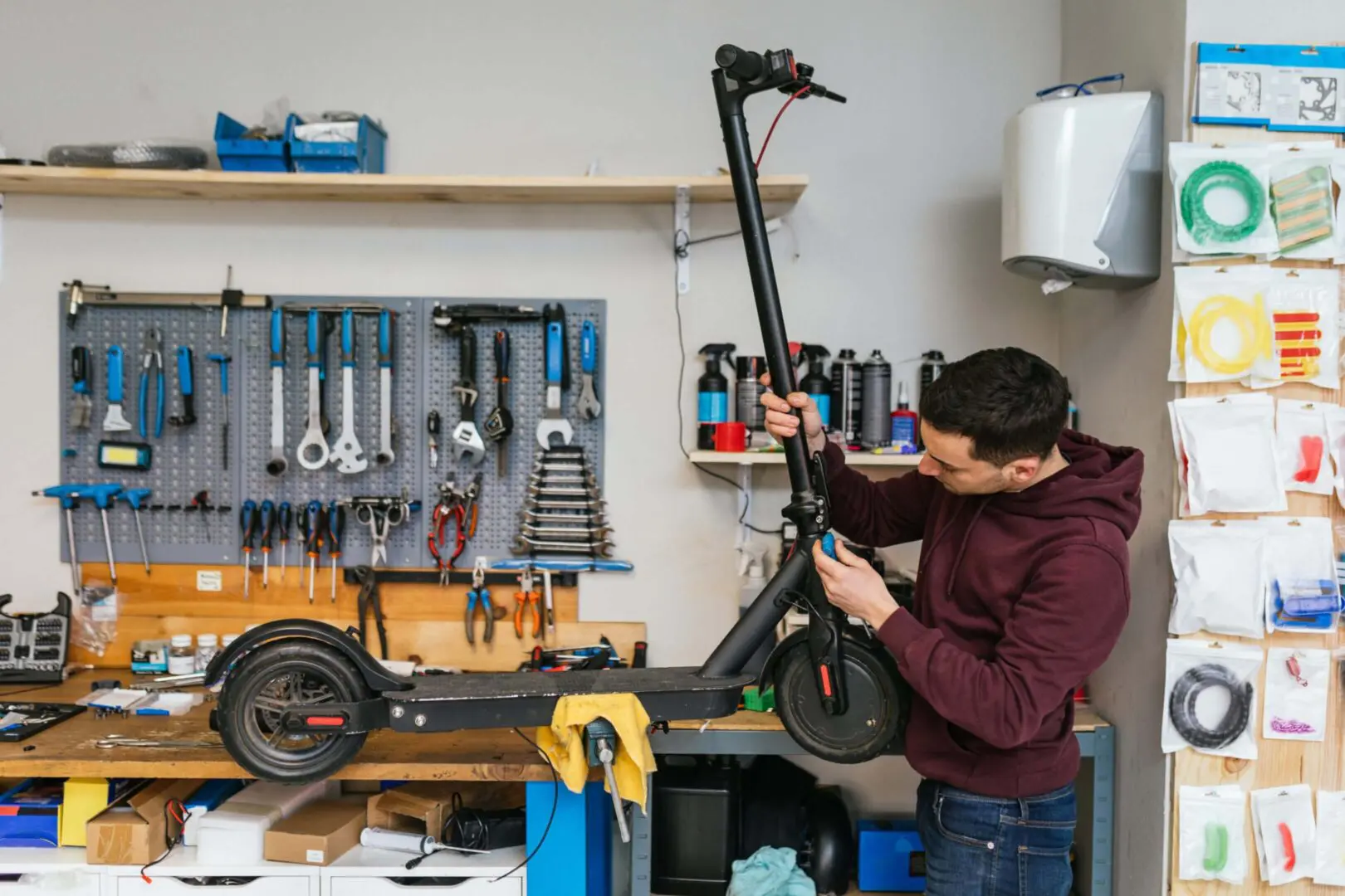 A team of professionals doing mobility scooter repair for a customer.