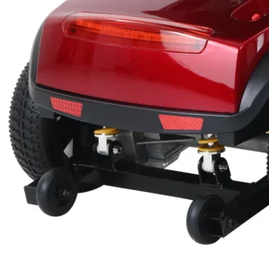Rear view of a red mobility scooter showing wheels and support frame.